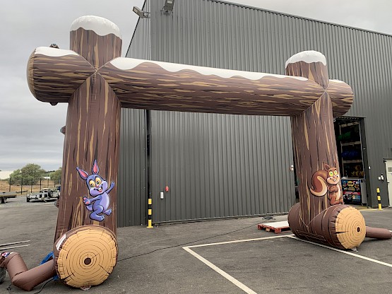 Déco gonflable d'arche imitation rondin de bois pour village de noël et fêtes de fin d'année