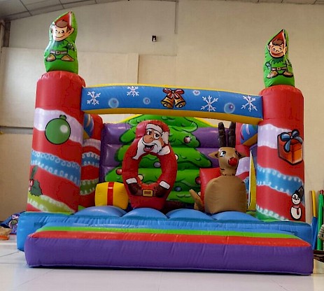 Château Gonflable de Noël avec décor de fête - Neuf