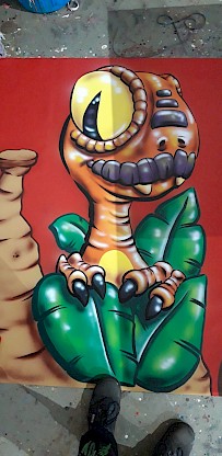 Dino peint à la main pour décor de jeu gonflable